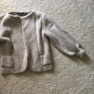 Wool bell sleeved sweater